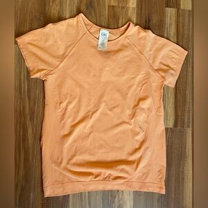 Athleta Girl Power Up Seamless Regular Length Tee | Girls Size XL